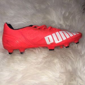 Coral puma soccer cleats